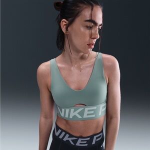 Nike Pro Indy Plunge
Med-Support Padded Sports Bra Cannon/Jade Ice/White SZ SM